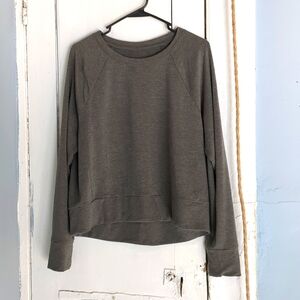 Light weight sweatshirt no tags size M gray green color. Waist length